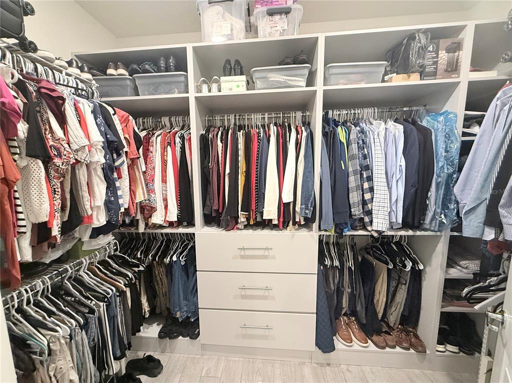 1994 Spring Shower Circle Kissimmee, FL 34744 - Photo 17 of 29 a view of walk in closet with clothes and shoes