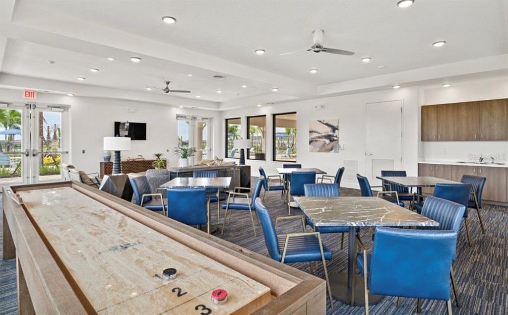 1994 Spring Shower Circle Kissimmee, FL 34744 - Photo 23 of 29 a view of a dining room with furniture
