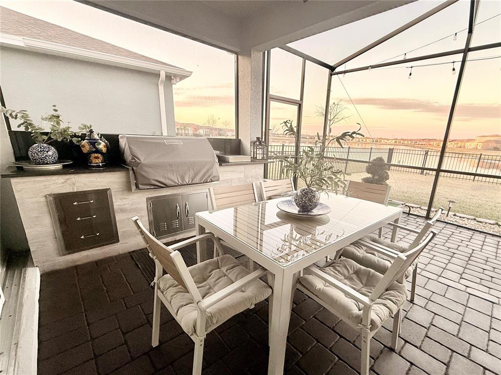 1994 Spring Shower Circle Kissimmee, FL 34744 - Photo 4 of 29 a living room with a table and chairs