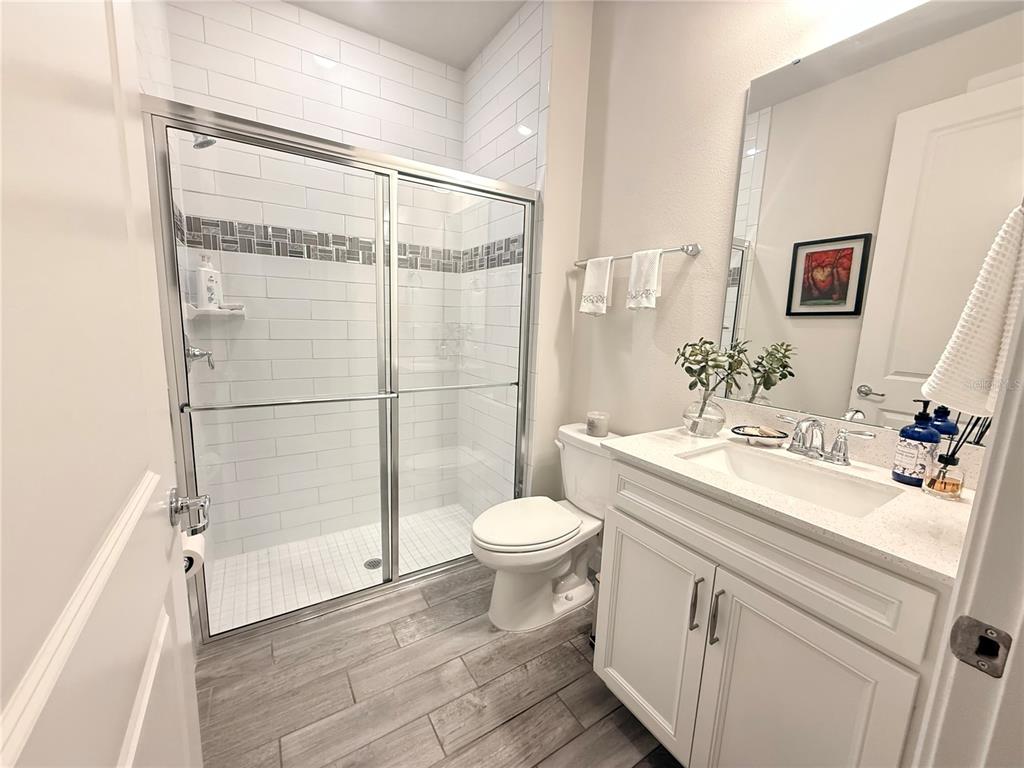 1994 Spring Shower Circle Kissimmee, FL 34744 - Photo 10 of 29 a bathroom with a sink toilet and shower