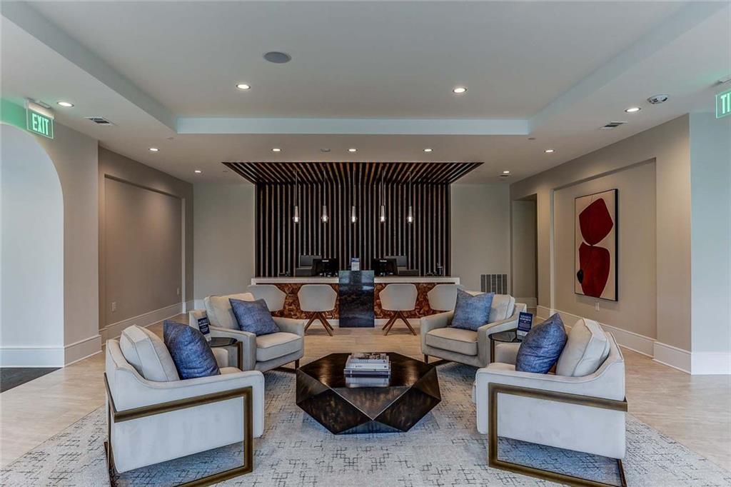 1003 Ridgewalk Parkway, Unit 4316 Woodstock, GA 30189 - Photo 38 of 38 a living room with furniture and a large window
