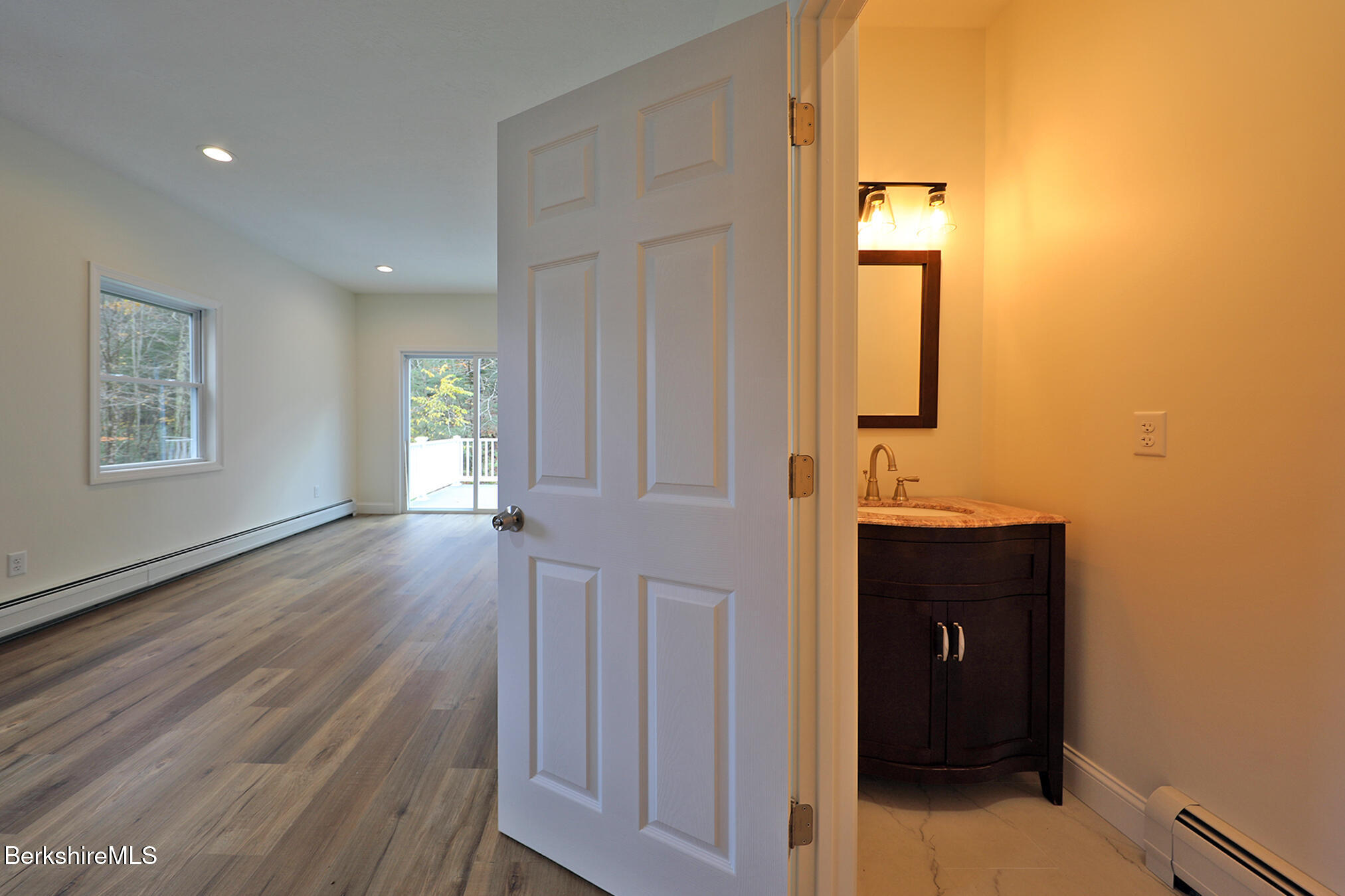 165 Sandisfield Road Sandisfield, MA 01255 - Photo 15 of 49 a view of hallway with window and wooden floor