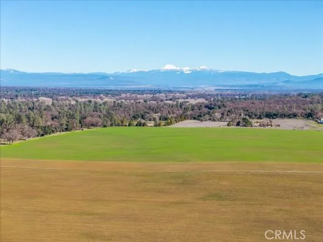 a view of an ocean and mountain