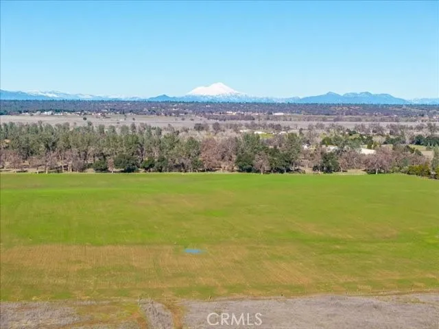 a view of an ocean and a mountain