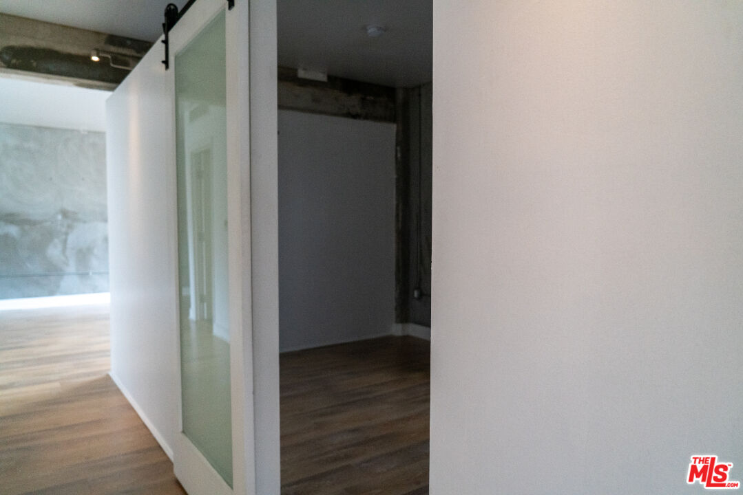 416 South Spring Street, Unit 906 Los Angeles, CA 90013 - Photo 9 of 18 a view of a hallway