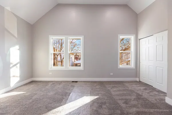 an empty room with windows