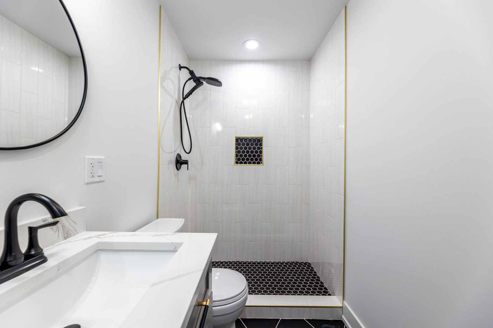 5552 South Shields Avenue Chicago, IL 60621 - Photo 27 of 33 a bathroom with a sink and a mirror
