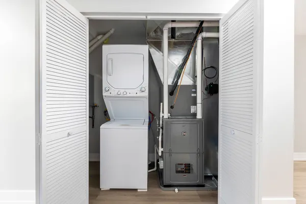 a utility room with dryer and washer