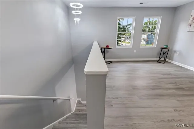 an empty room with windows