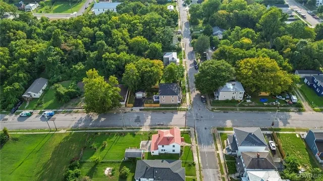 an aerial view of house with yard