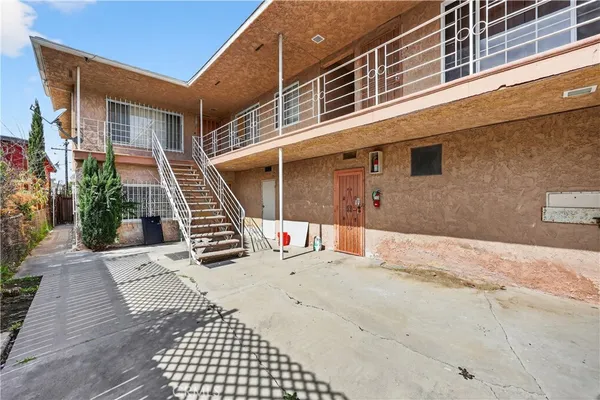 a view of a backyard with a patio