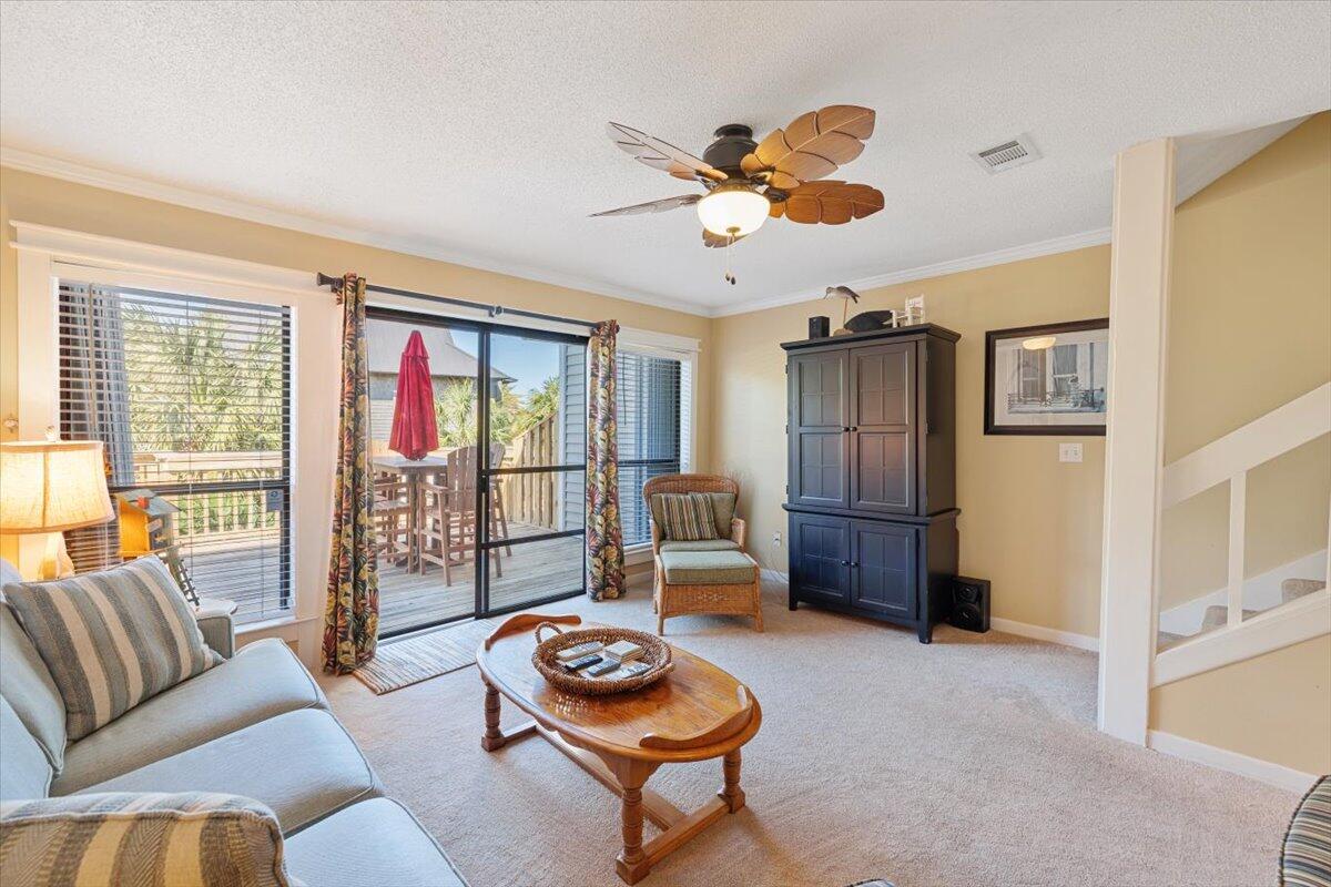 255 Pelican Circle, Unit 3 Inlet Beach, FL 32461 - Photo 16 of 38 a living room with furniture and a window