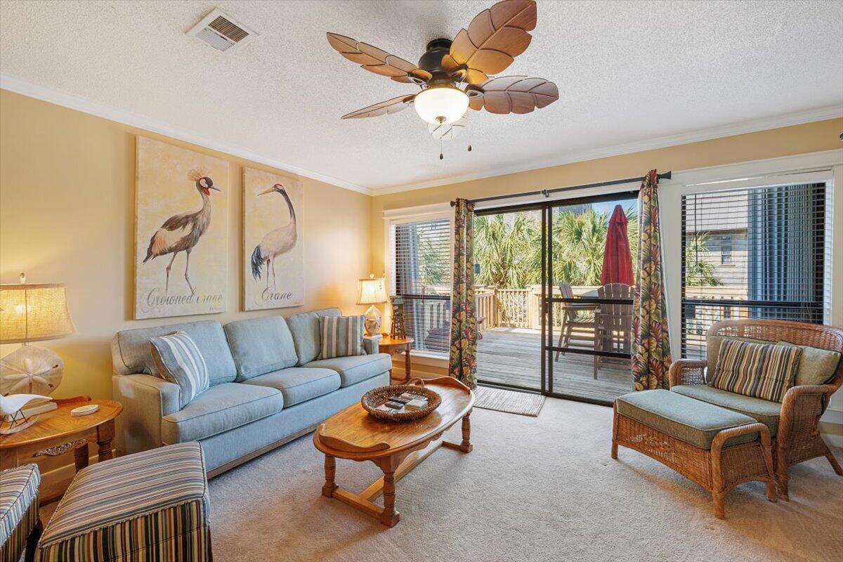 255 Pelican Circle, Unit 3 Inlet Beach, FL 32461 - Photo 17 of 38 a living room with furniture and a large window