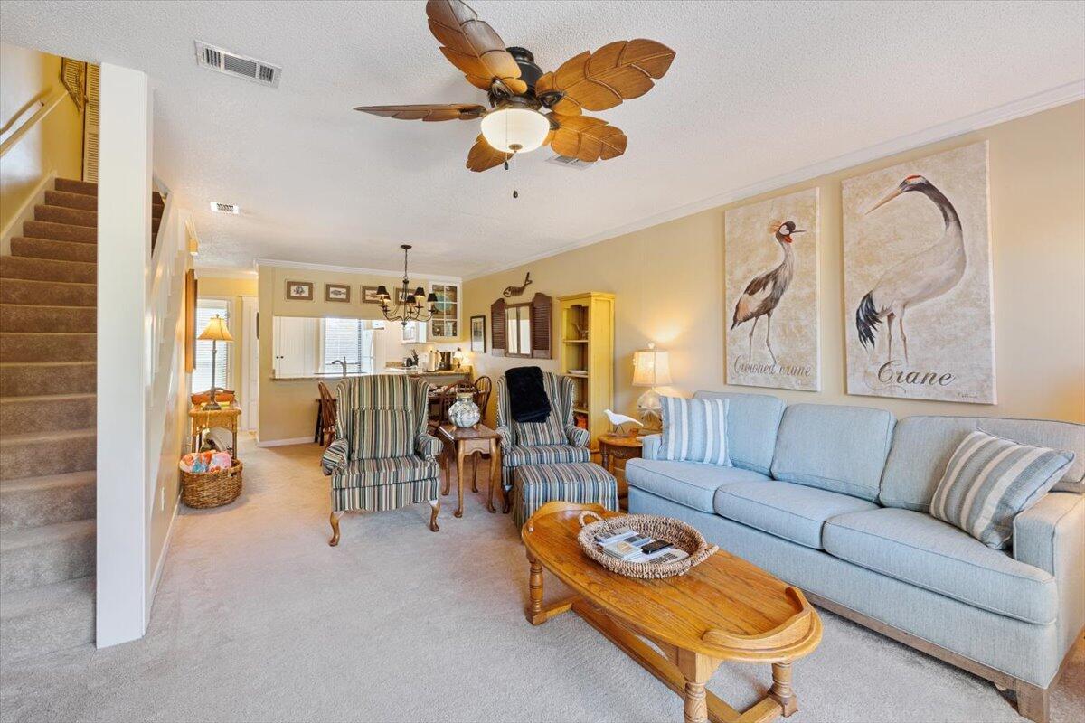 255 Pelican Circle, Unit 3 Inlet Beach, FL 32461 - Photo 19 of 38 a living room with furniture kitchen view and a window