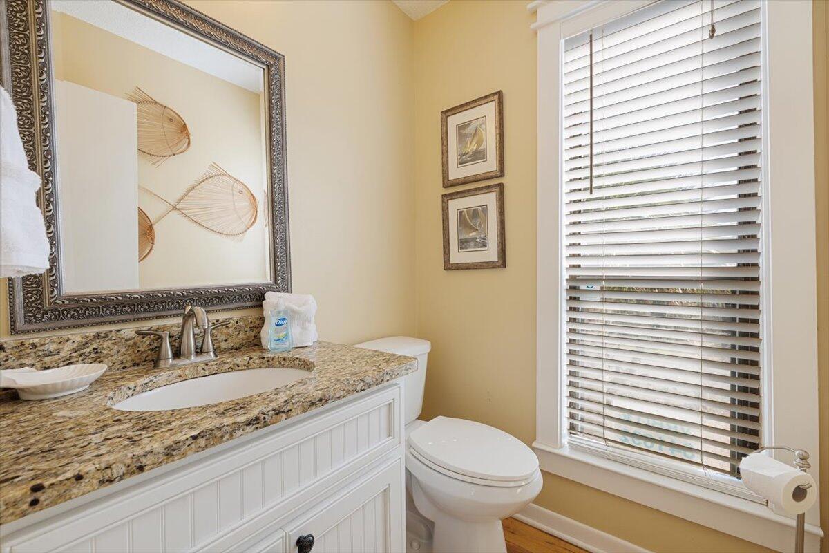 255 Pelican Circle, Unit 3 Inlet Beach, FL 32461 - Photo 20 of 38 a bathroom with a granite countertop sink and a mirror