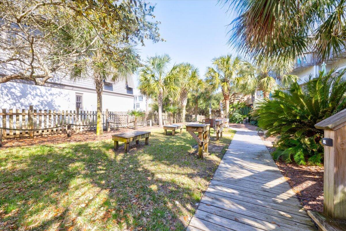 255 Pelican Circle, Unit 3 Inlet Beach, FL 32461 - Photo 31 of 38 a view of yard with swimming pool and seating