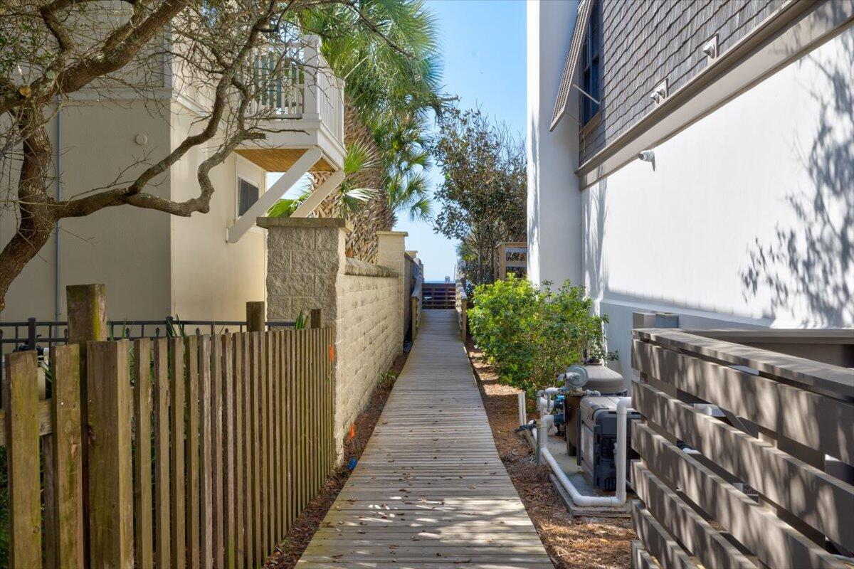 255 Pelican Circle, Unit 3 Inlet Beach, FL 32461 - Photo 32 of 38 a view of a pathway of a house with a fountain