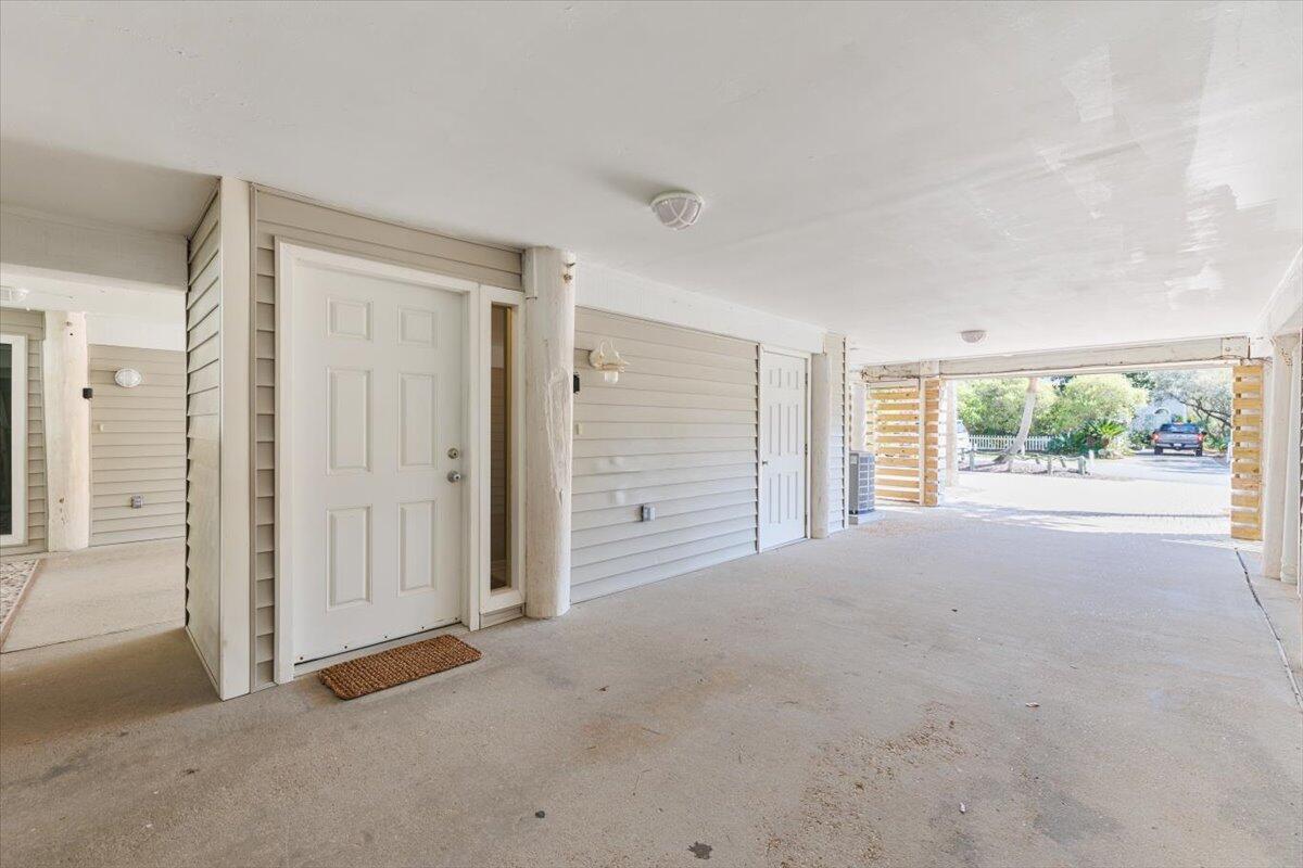 255 Pelican Circle, Unit 3 Inlet Beach, FL 32461 - Photo 33 of 38 an empty room with windows and closet