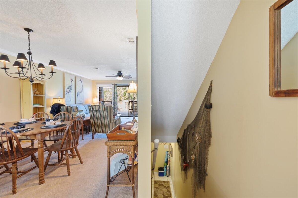 255 Pelican Circle, Unit 3 Inlet Beach, FL 32461 - Photo 7 of 38 a view of a dining room with furniture window and outside view