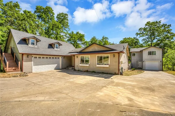 a front view of a house with a outdoor space