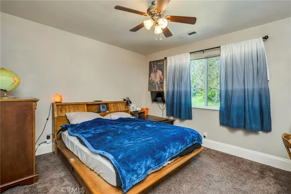 a view of house with yard