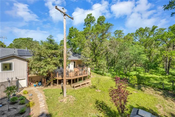 a kitchen with stainless steel appliances granite countertop a sink and dishwasher a stove with wooden floor