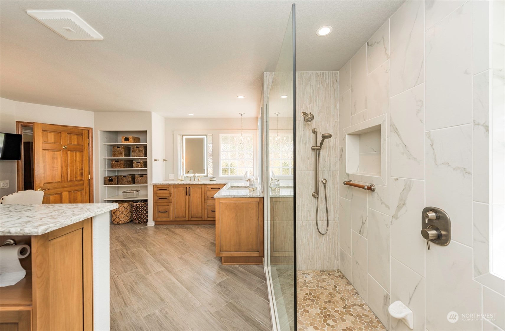 82 Owls Nest Road Sequim, WA 98382 - Photo 19 of 40 a bathroom with a tub shower and a sink