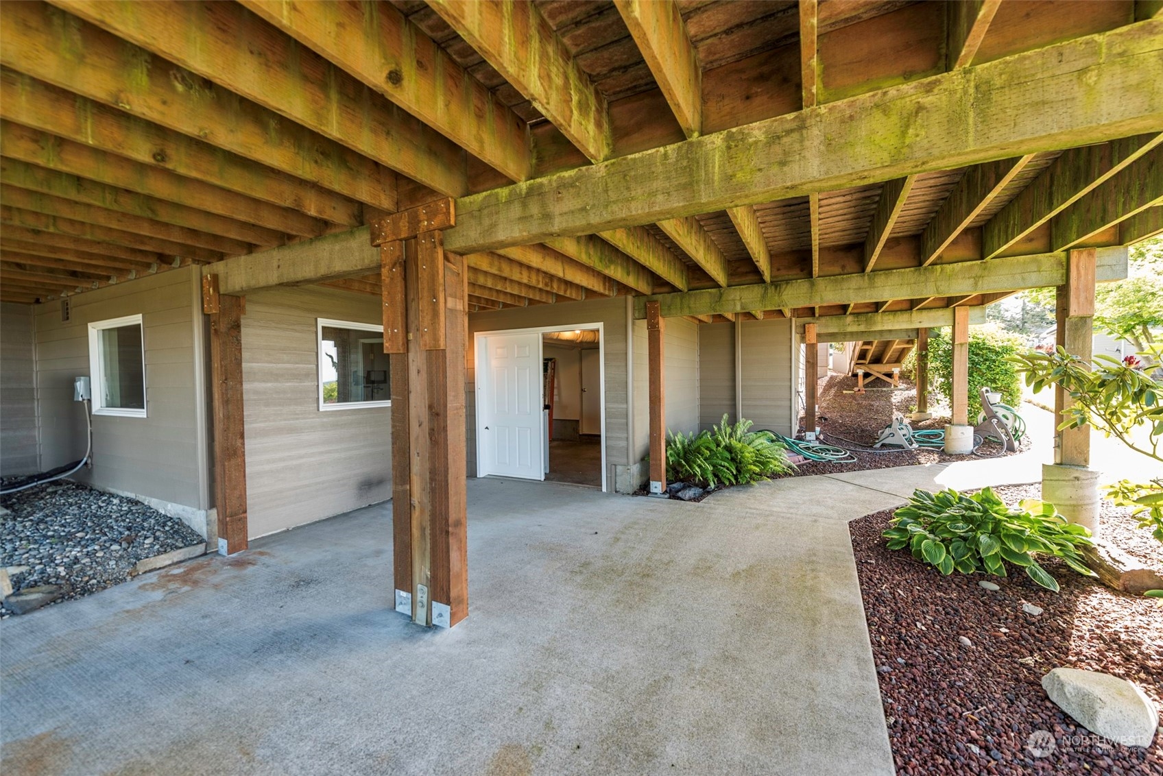 82 Owls Nest Road Sequim, WA 98382 - Photo 31 of 40 a view of a room with wooden walls