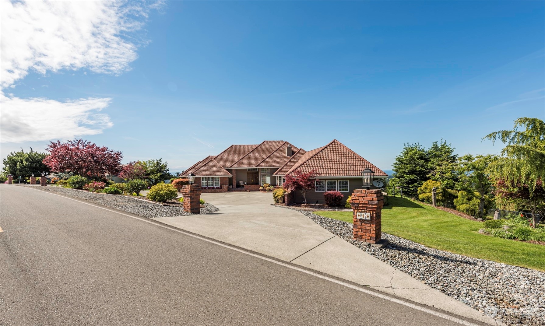 82 Owls Nest Road Sequim, WA 98382 - Photo 35 of 40 a view of a house with a yard and garden