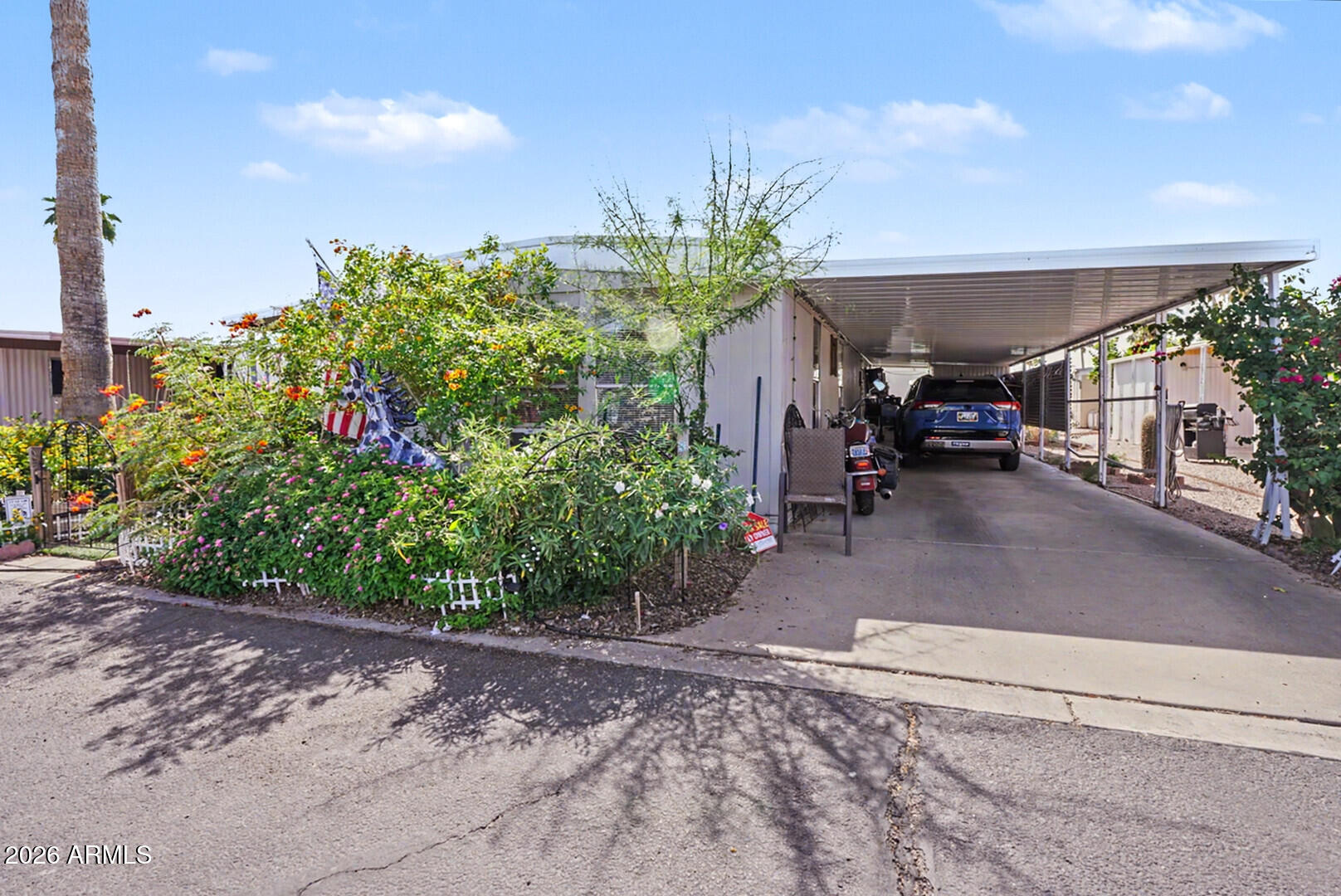 2605 South Tomahawk Road, Unit 65 Apache Junction, AZ 85119 - Photo 11 of 11 carport