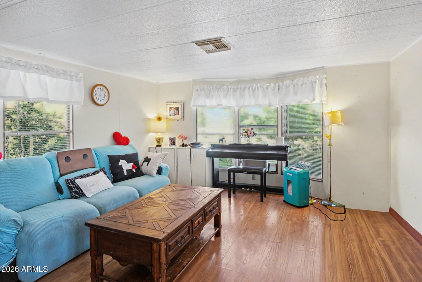 2605 South Tomahawk Road, Unit 65 Apache Junction, AZ 85119 - Photo 3 of 11 Living Room with Bay window