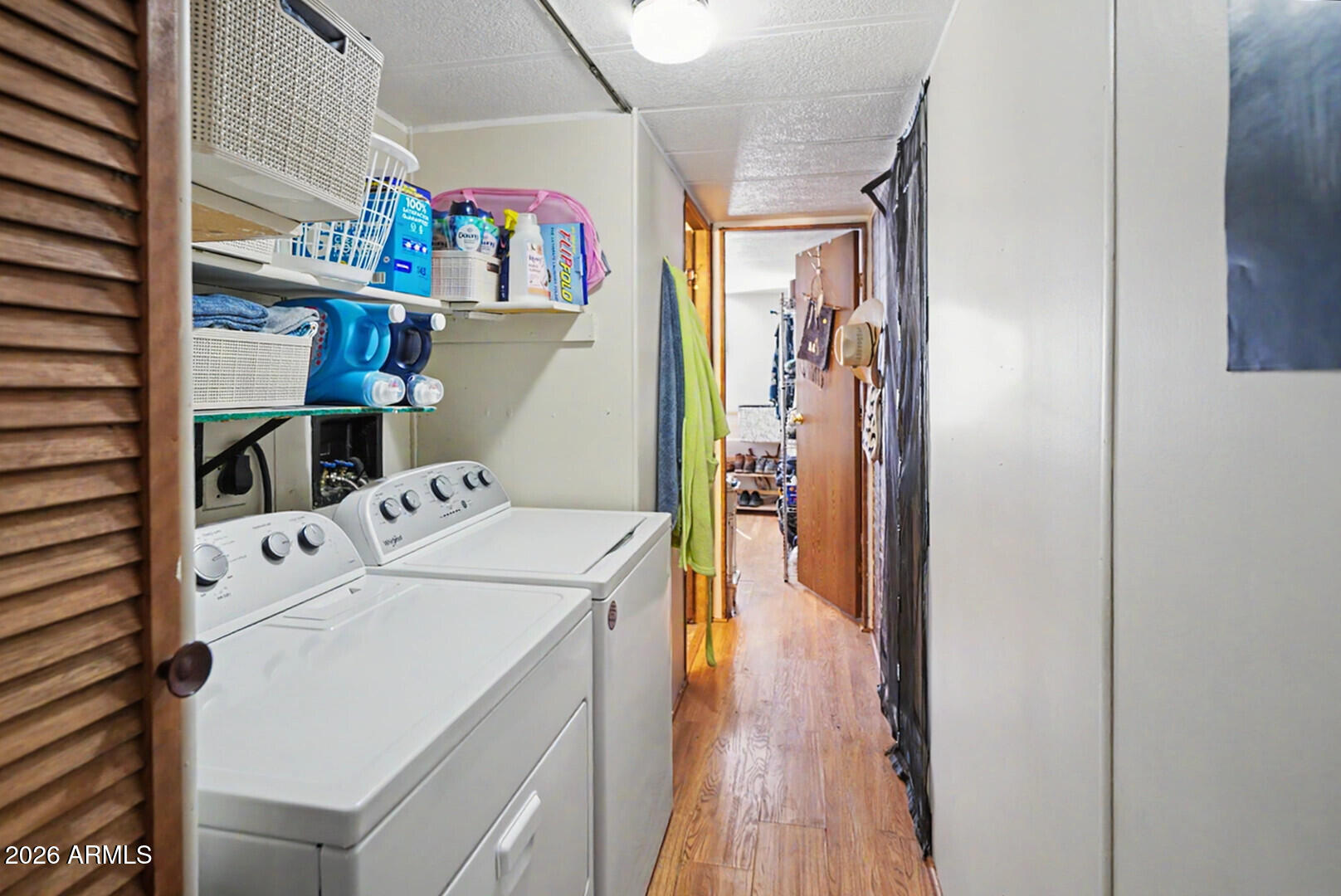 2605 South Tomahawk Road, Unit 65 Apache Junction, AZ 85119 - Photo 7 of 11 Inside Washer & Dryer