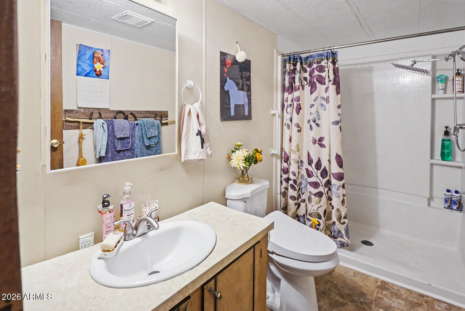 2605 South Tomahawk Road, Unit 65 Apache Junction, AZ 85119 - Photo 8 of 11 Bathroom with walk-in shower