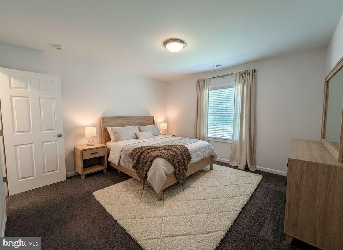 7905 Chalice Road Severn, MD 21144 - Photo 27 of 56 Serene bedroom with natural light.