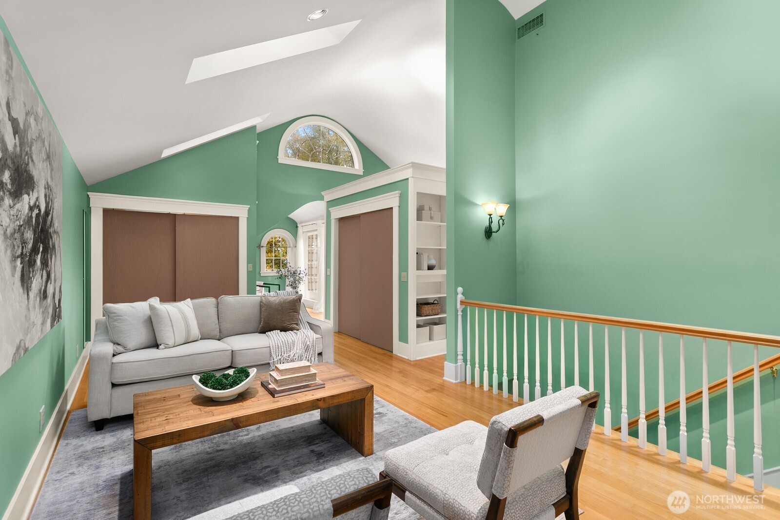 615 36th Avenue Seattle, WA 98122 - Photo 22 of 40 a living room with furniture and a wooden floor