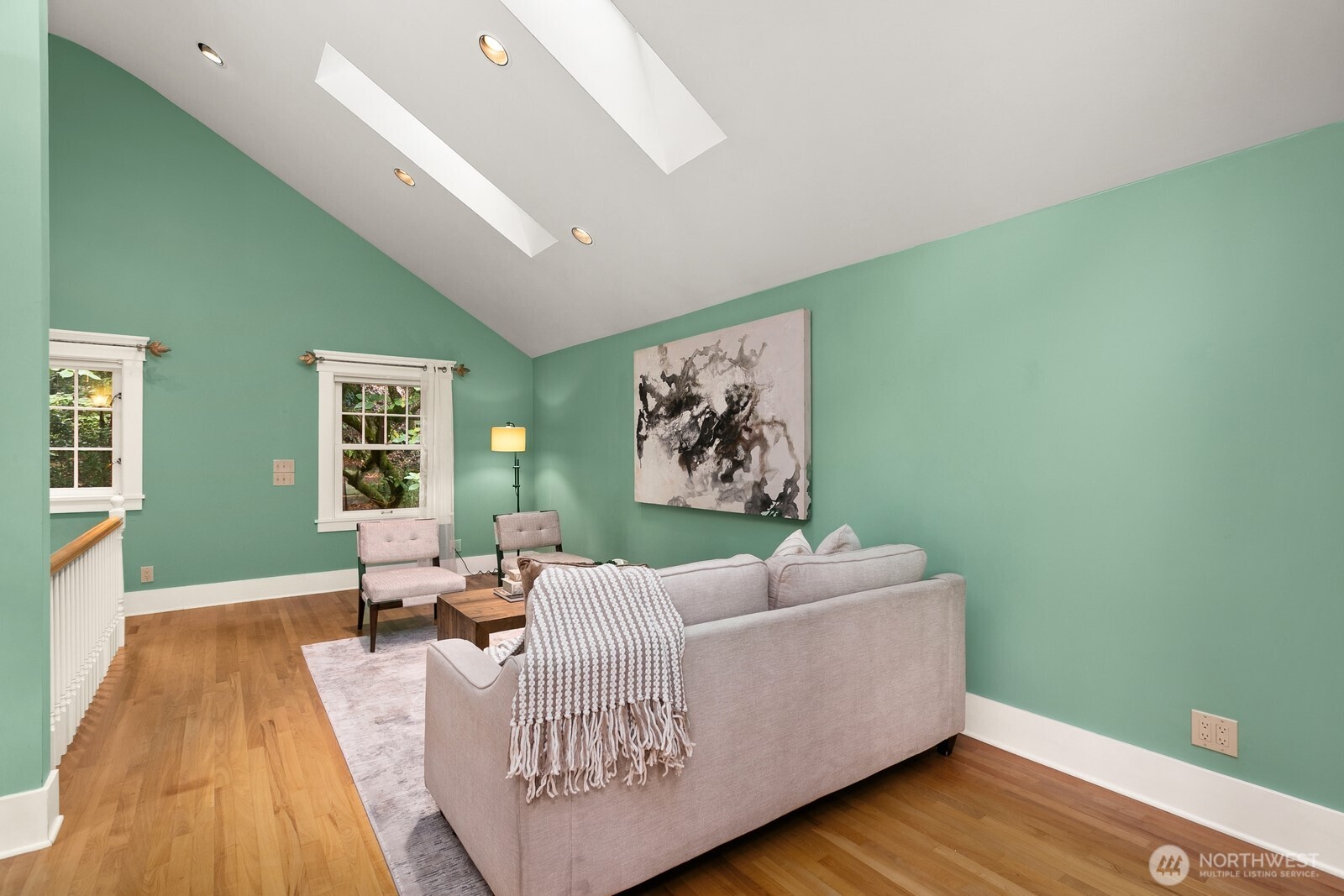 615 36th Avenue Seattle, WA 98122 - Photo 23 of 40 a living room with furniture and a wooden floor
