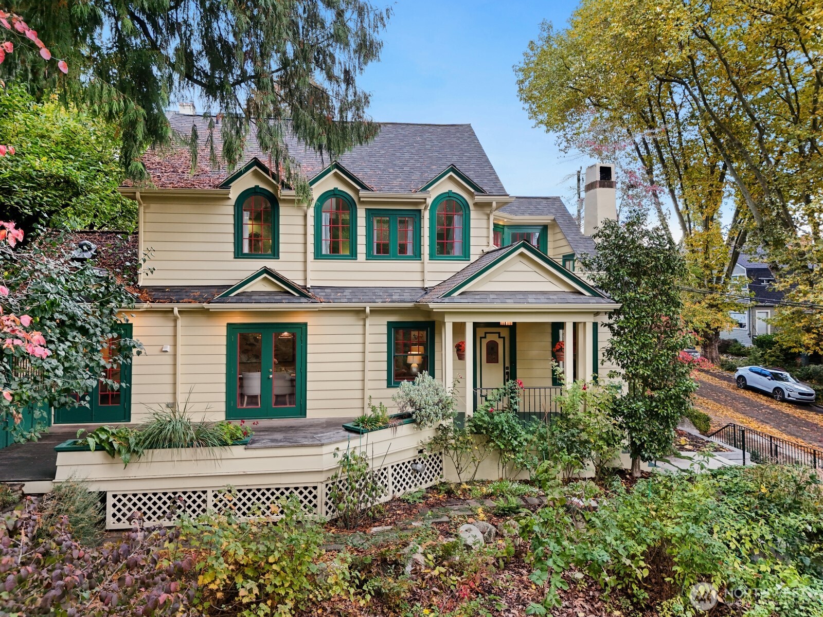 615 36th Avenue Seattle, WA 98122 - Photo 3 of 40 a front view of a house with a yard