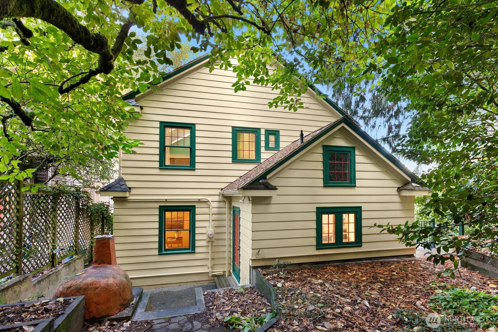 615 36th Avenue Seattle, WA 98122 - Photo 36 of 40 a front view of a house with a tree