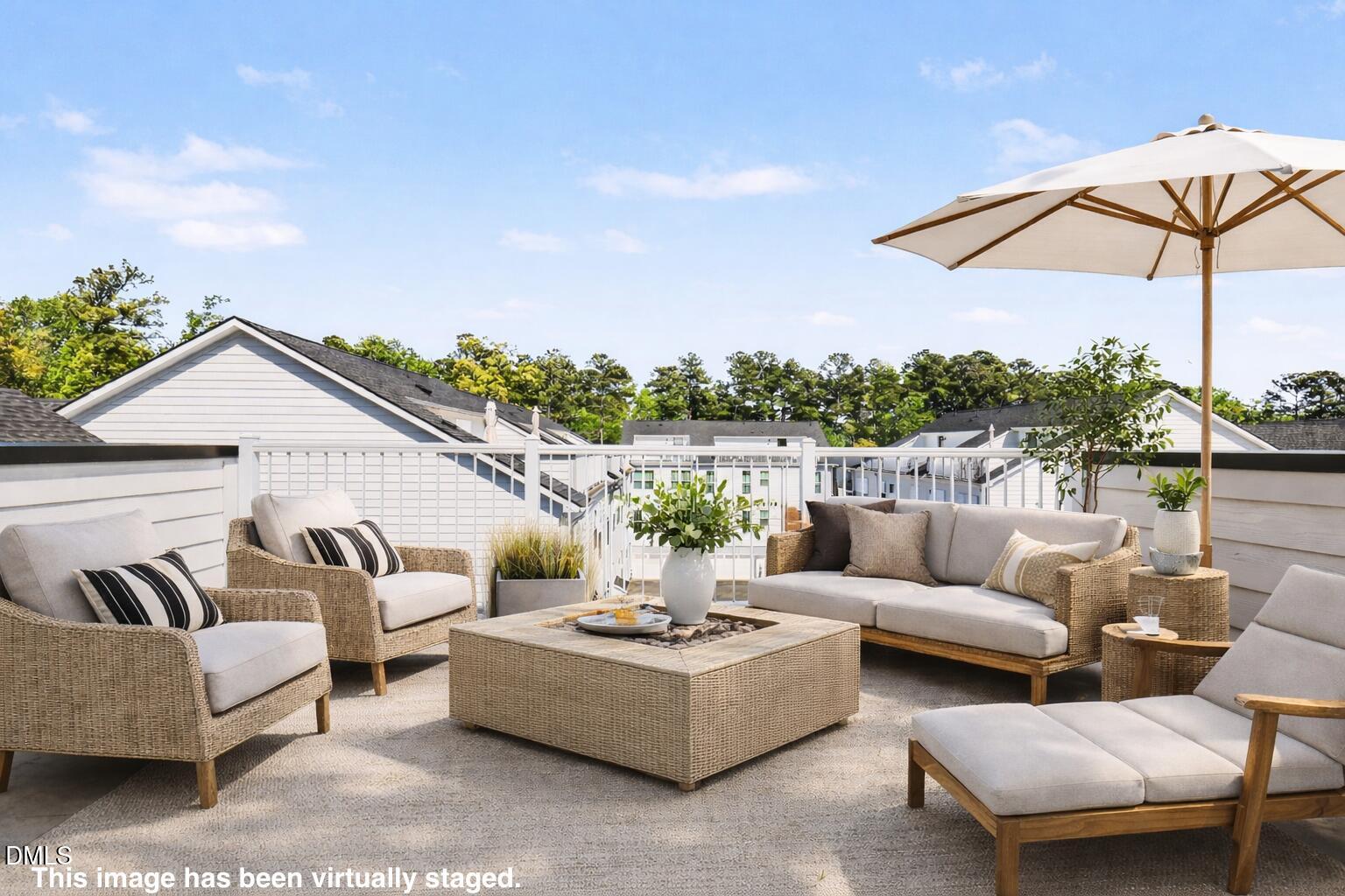11549 Helmond Way, Unit 115 Raleigh, NC 27617 - Photo 22 of 25 a view of a patio with couches and potted plants