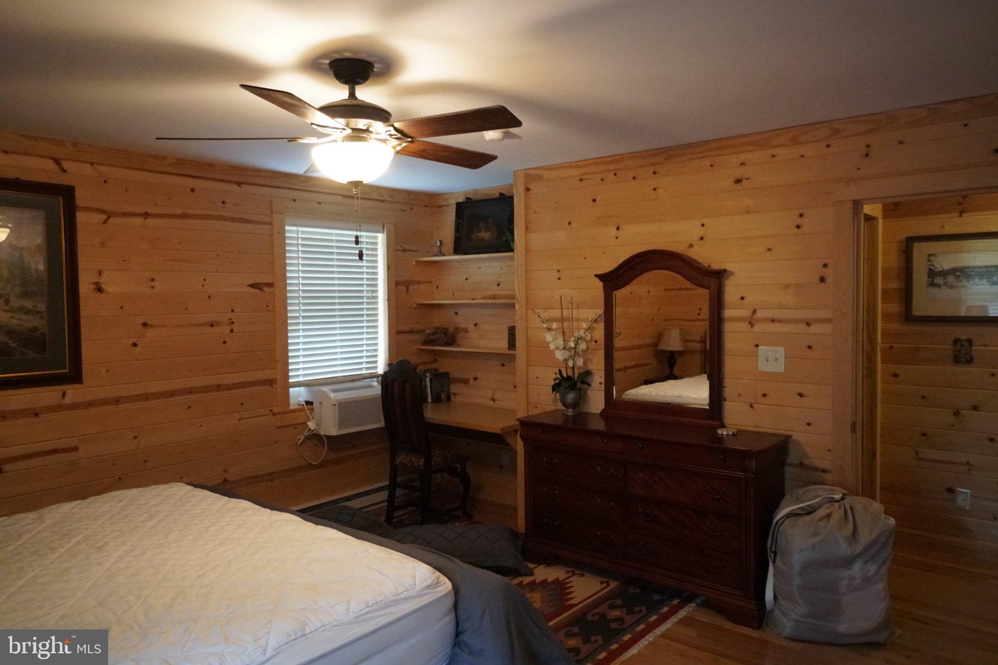 150 Sharp Ridge Lane Franklin, WV 26807 - Photo 30 of 69 Cozy cabin retreat with wooden charm.
