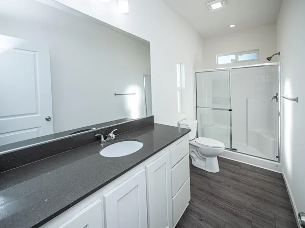 an empty room with closet area