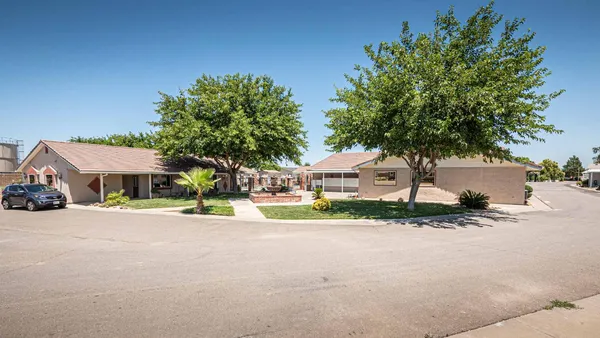 a view of a house with swimming pool