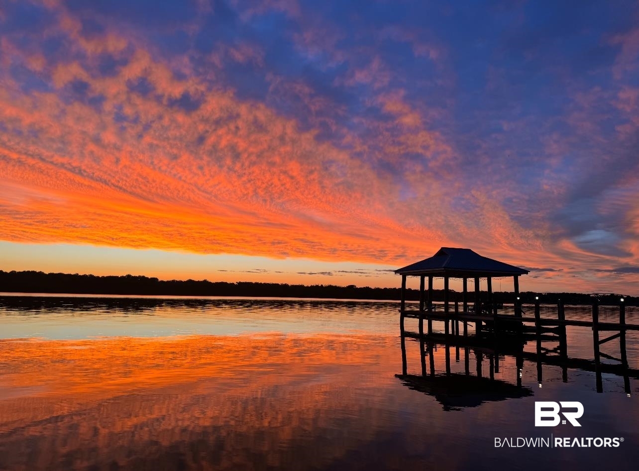 41997 Bayou Road Bay Minette, AL 36507 - Photo 1 of 68 Dock area with a water view and breathtaking sunset