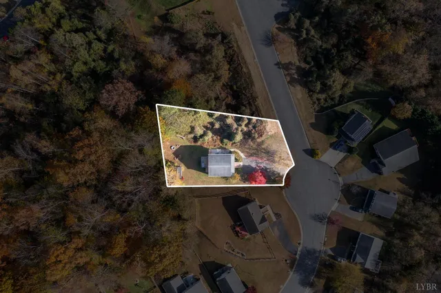 a kitchen with granite countertop stainless steel appliances and wooden cabinets