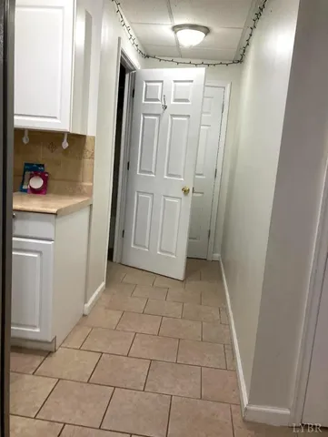 a view of a kitchen with a sink