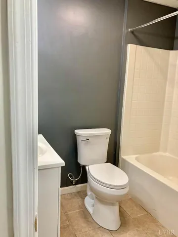 a backyard of a house with fountain