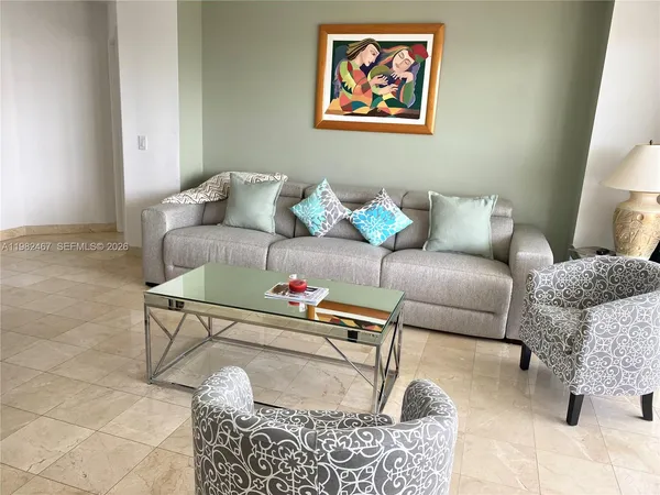 a living room with furniture and a couch