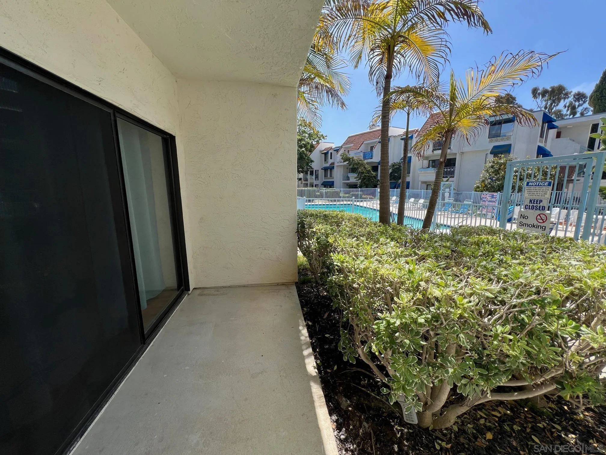 8310 Regents Road, Unit 1E San Diego, CA 92122 - Photo 3 of 23 a view of a back yard of the house