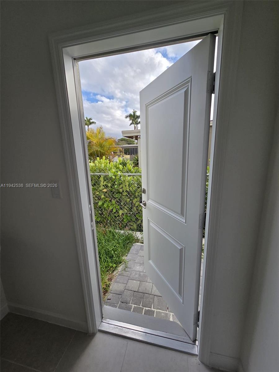 16303 Southwest 147th Place, Unit 16303 Miami, FL 33193 - Photo 30 of 37 a view of entryway