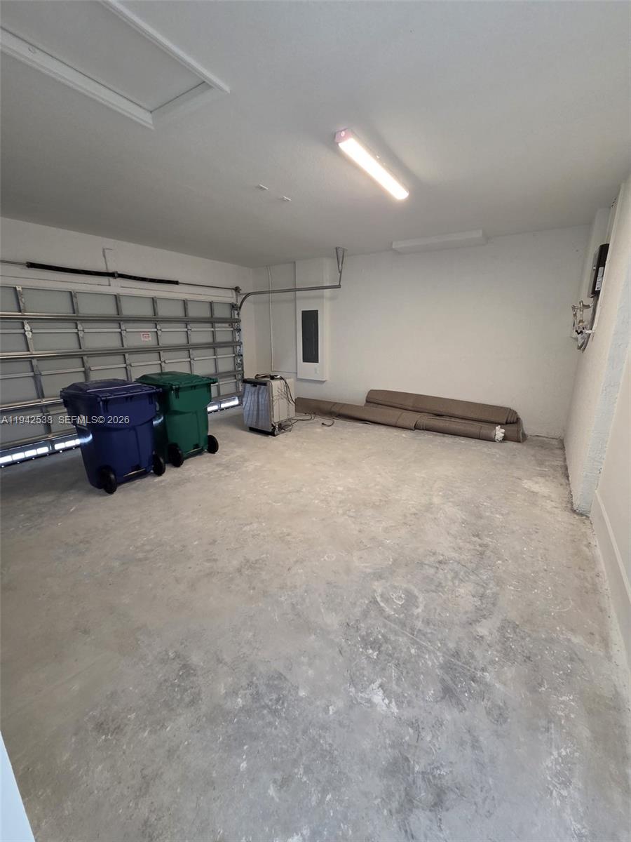 16303 Southwest 147th Place, Unit 16303 Miami, FL 33193 - Photo 33 of 37 a view of a storage & utility room